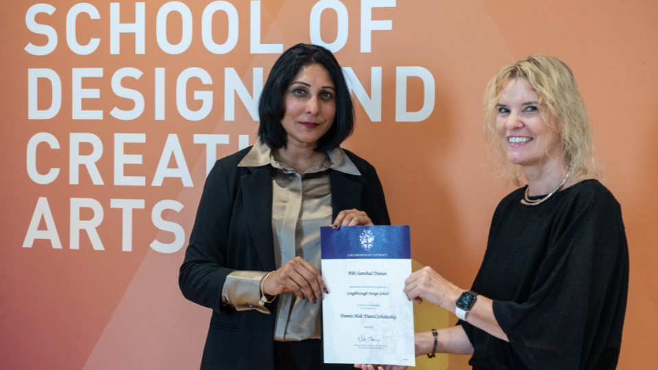 Bibi, Dennis Holt Prize Winner stood with certificate